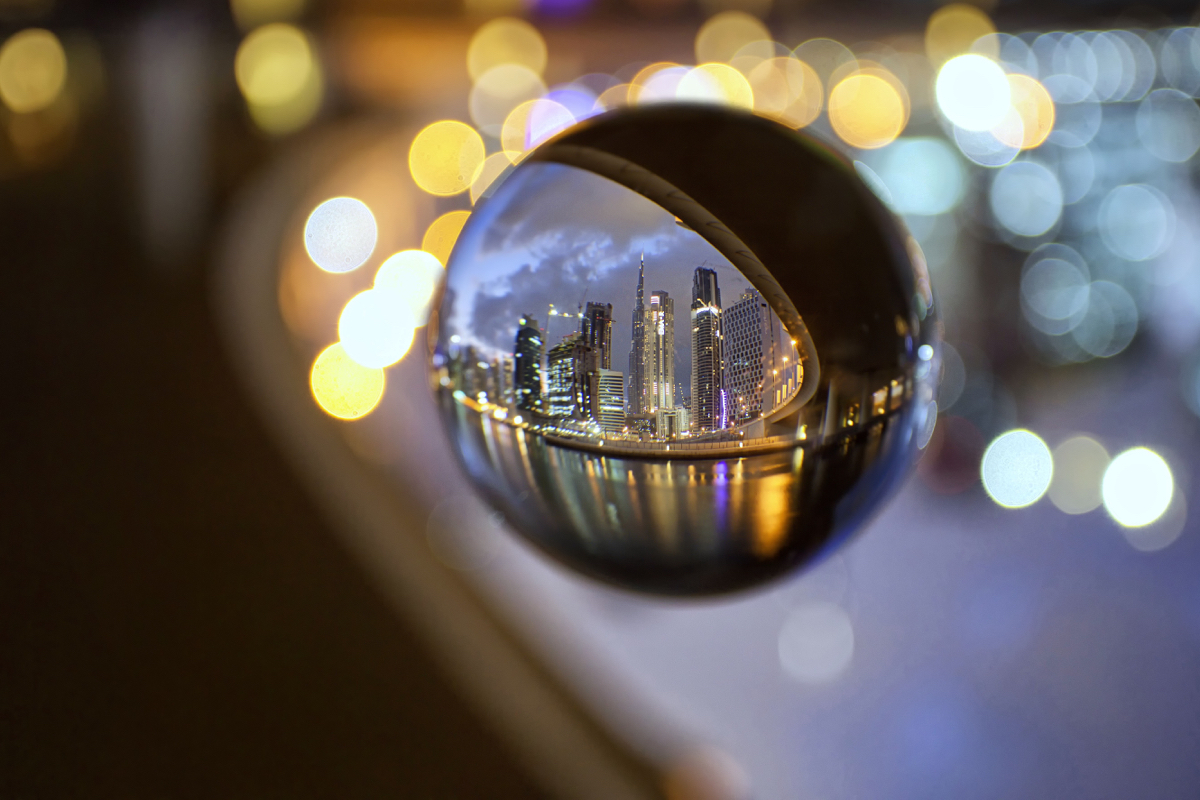 Lensball photography in Dubai. The Burj Khalifa photographed at night through a crystal ball.
